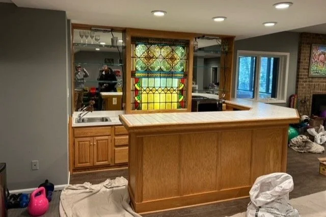 Modern basement bar bottle display and lighting Potomac MD